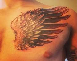Eric is a tattoo lover and has engraved a big tattoo which covers his shoulder and chest. Also has tattoo on  one of his arm.
